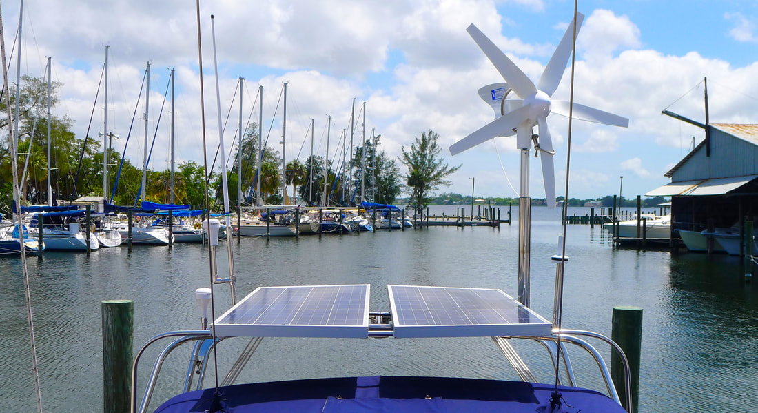 Solar panel and wind generator installation by Snead Island Boat Works